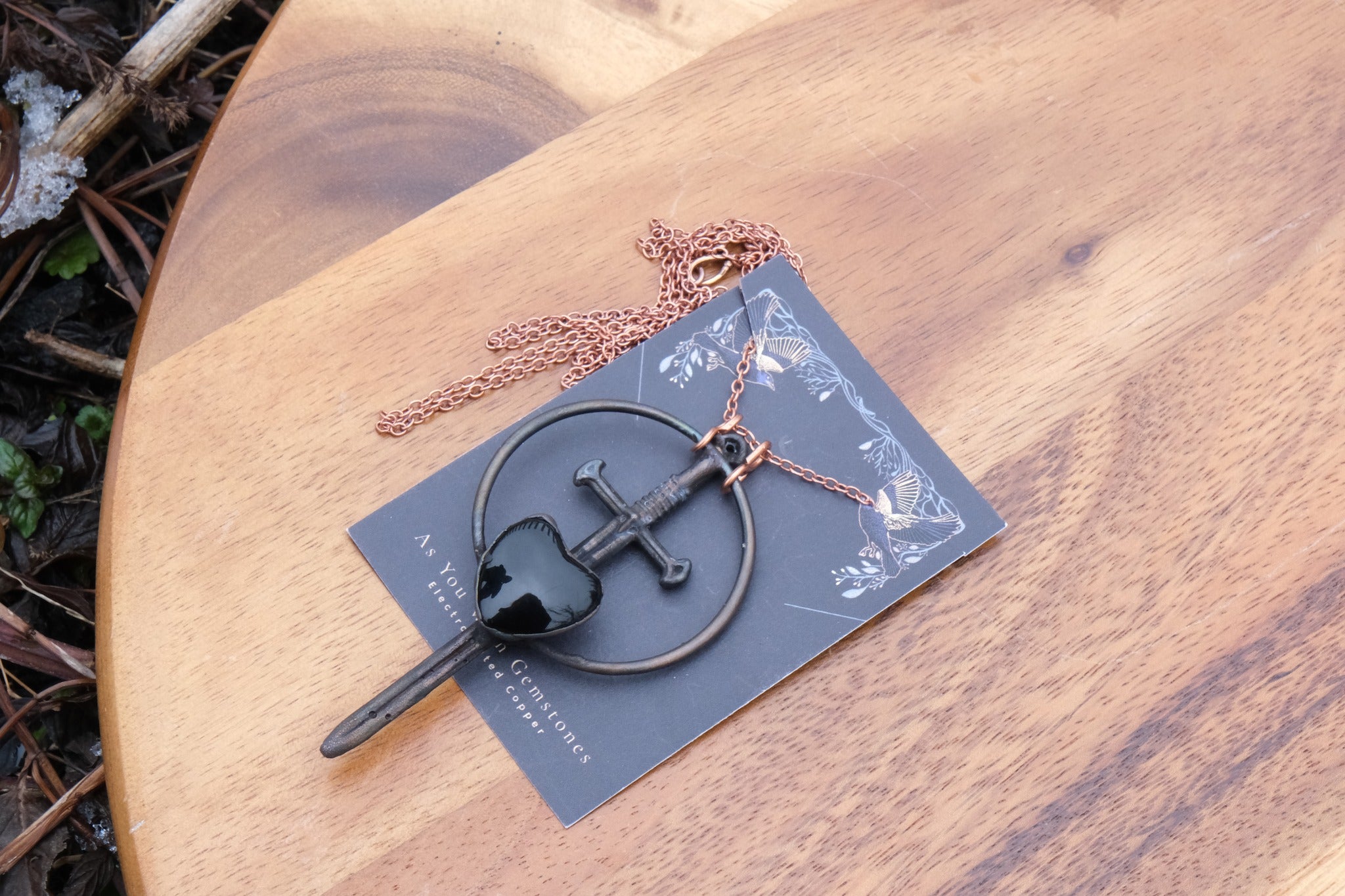 Electroplated Anduril Sword with a Onyx Heart Necklace