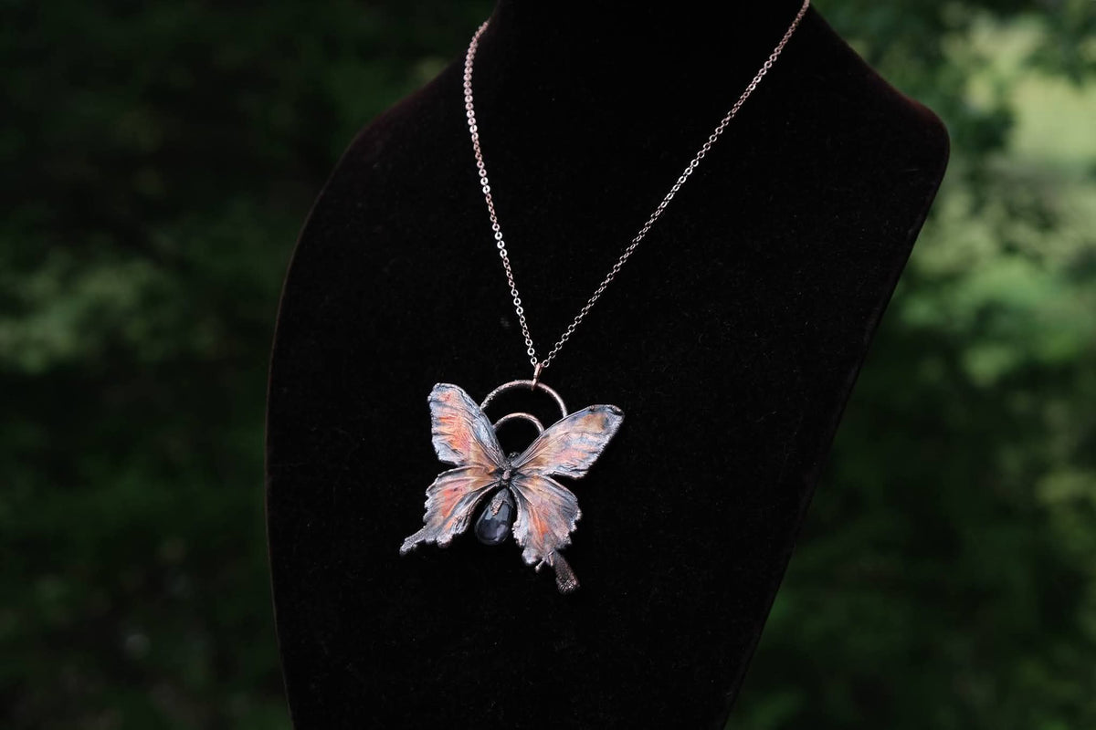 Electroplated Butterfly with an Amethyst Tear Drop Necklace