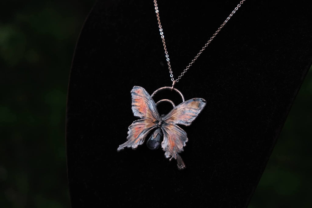 Electroplated Butterfly with an Amethyst Tear Drop Necklace