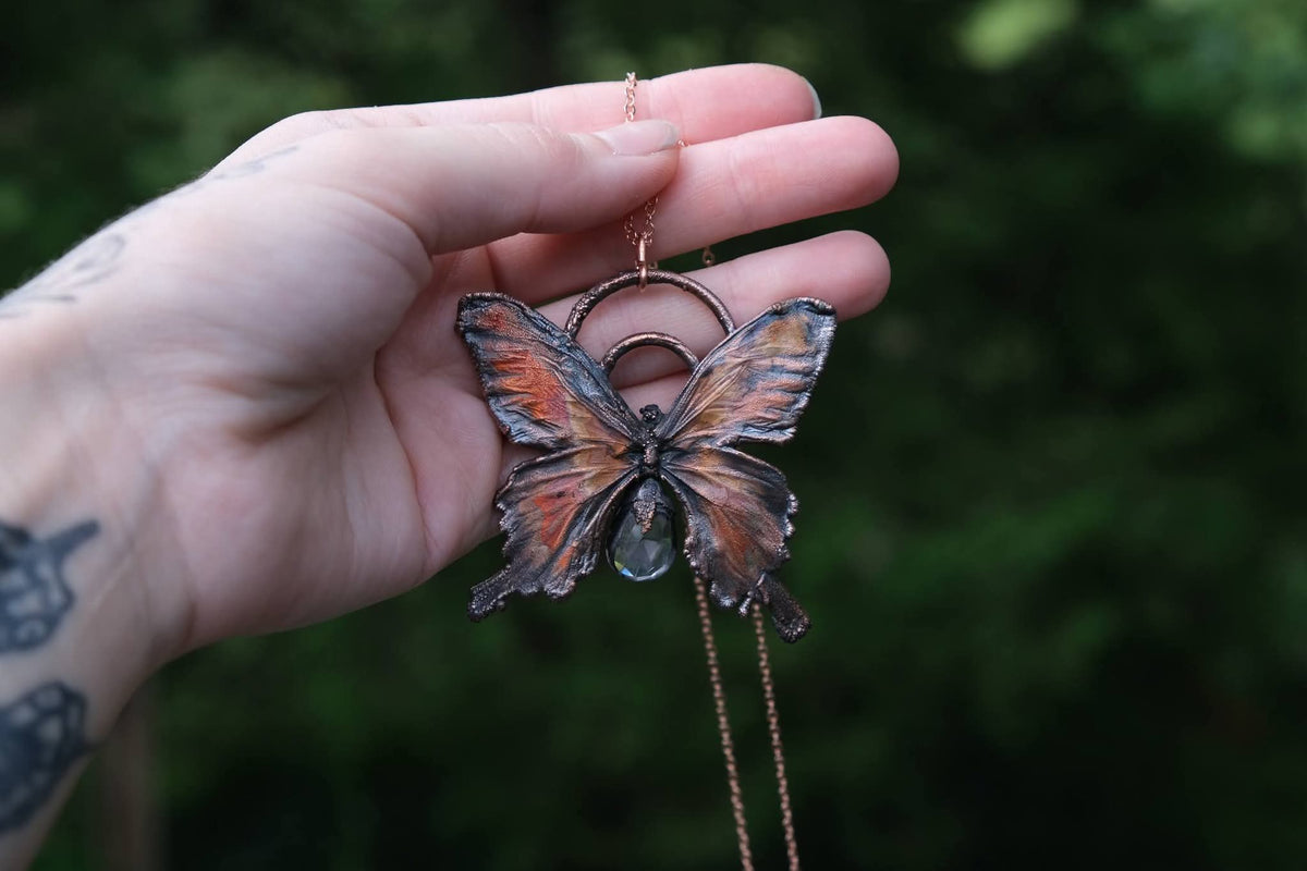 Electroplated Butterfly with an Amethyst Tear Drop Necklace